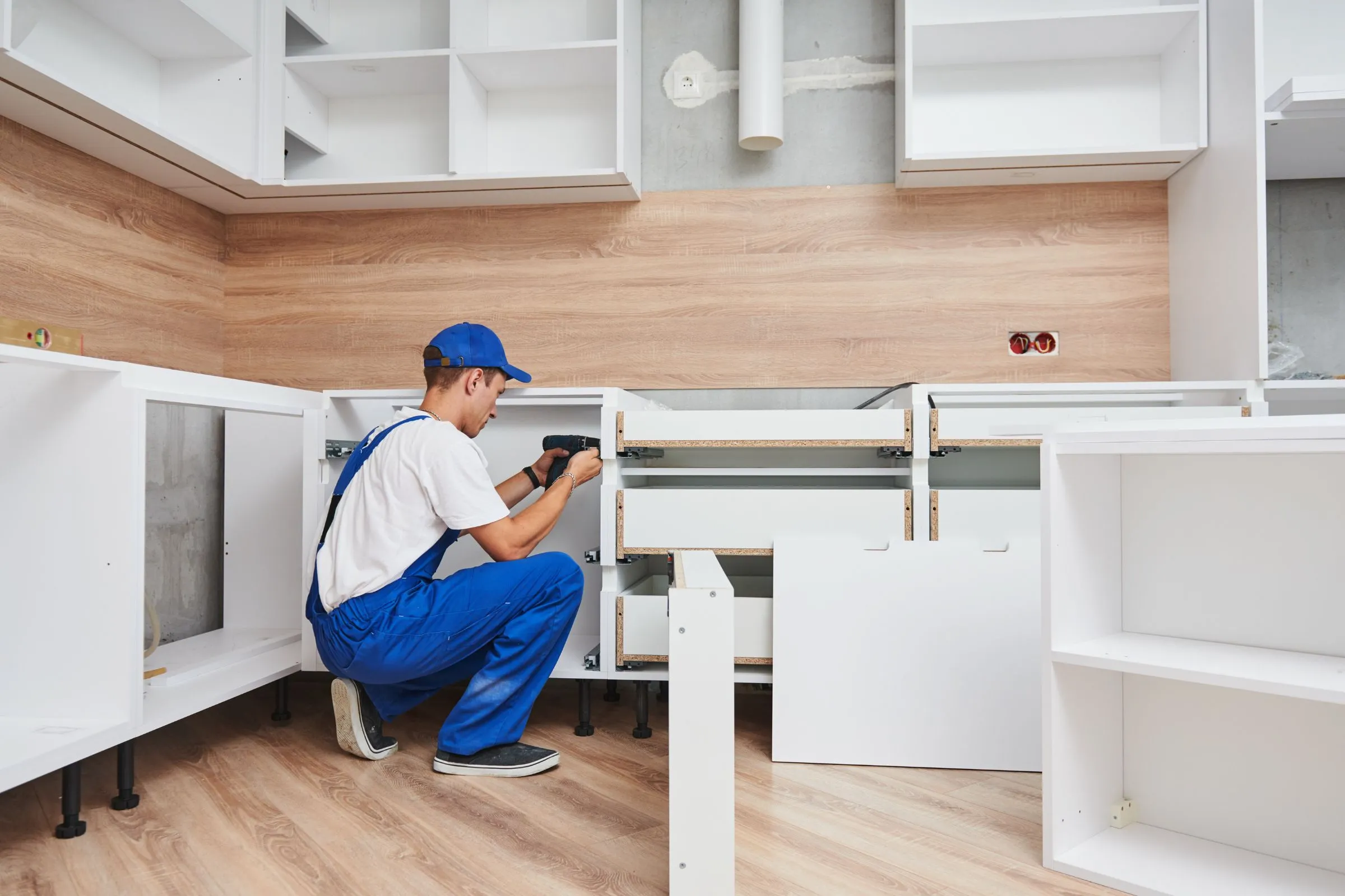 Go Movers LA team wearing white gloves while carefully handling a protected marble vase for a premium delivery in LA.